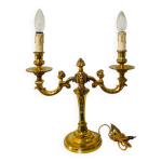 Chandelier en bronze  dcors de putti et cariatides, dbut xxe