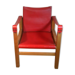 Chauffeuse bois et cuir rouge années 60 Chauffeuse bois et cuir rouge années 60