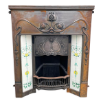 Chemine  foyer ouvert en fonte, de style art nouveau