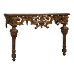 Console murale dorée et sculptée de style baroque italien du xxe siècle Console murale dorée et sculptée de style baroque italien du xxe siècle