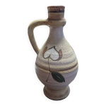Cruche ou jarre artisanale avec une anse vase en poterie terre cuite effet fat lava fleurs stylises