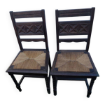 Duo de chaises vintage en bois sculpté et assise en paille tressée - style Duo de chaises vintage en bois sculpté et assise en paille tressée - style