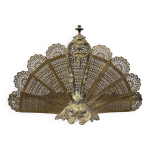 cran de chemine ancien en laiton modle ventail ajour