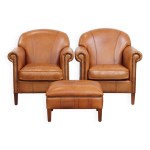Ensemble de 2 fauteuils en cuir + pouf couleur cognac