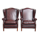 Ensemble de 2 fauteuils  oreilles en cuir de vache de style anglais