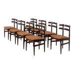 Ensemble de 8 chaises de salle � manger en palissandre et cuir danois par poul hundevad.