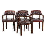Ensemble de quatre chaises de salle � manger en cuir de vachette chesterfield de style anglais.