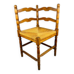 Fauteuil d'angle vintage en bois et assise en paille tresse