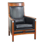 Fauteuil art déco en cuir de vachette noir et bois Fauteuil art déco en cuir de vachette noir et bois