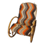 Fauteuil  bascule vintage en rotin avec coussin, annes 1960