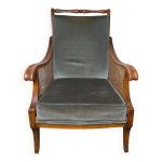 Fauteuil bergère style régence en bois, tissu et cannage Fauteuil bergère style régence en bois, tissu et cannage