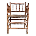Fauteuil bobbin ancien avec assise en paille Fauteuil bobbin ancien avec assise en paille