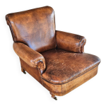 Fauteuil club en cuir de mouton anglais ancien avec accoudoirs