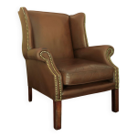 Fauteuil club  oreilles vintage en cuir, annes 1970