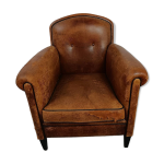Fauteuil club vintage en cuir de mouton - patine brute, essentiel pour man cave Fauteuil club vintage en cuir de mouton - patine brute, essentiel pour man cave