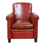 Fauteuil en cuir de mouton de couleur rouge / marron Fauteuil en cuir de mouton de couleur rouge / marron