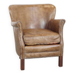 Fauteuil en cuir subtil avec coussin d'assise réversible en kilim Fauteuil en cuir subtil avec coussin d'assise réversible en kilim