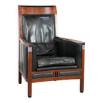Fauteuil en cuir de vache noir et design art d�co en bois