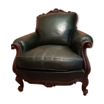 Fauteuil en cuir vert des annes 70 dans un style louis xv