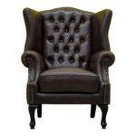 Fauteuil à oreilles chesterfield vintage en cuir Fauteuil à oreilles chesterfield vintage en cuir