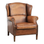 Fauteuil � oreilles en cuir de mouton charmant avec des couleurs chaudes.