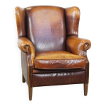 Fauteuil à oreilles vintage en cuir de mouton Fauteuil à oreilles vintage en cuir de mouton