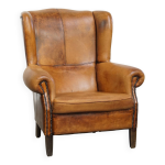 Fauteuil  oreilles vintage en cuir de mouton