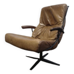 Fauteuil pivotant industriel en cuir cognac