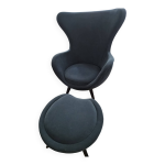 Fauteuil avec son repose pieds assorti. style egg chair.