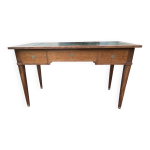 Grand bureau plat de style louis xvi en acajou et en placage d'acajou