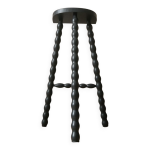 Haut tabouret tripode porte plante en bois perlé peint en noir Haut tabouret tripode porte plante en bois perlé peint en noir