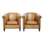 Lot de 2 fauteuils club en cuir de mouton par nico van oorschot