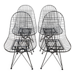 Lot de 4 chaises noires vintage eames Lot de 4 chaises noires vintage eames