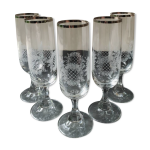 Lot 5 fltes champagne. en verre cristallin. style empire. motifs floraux