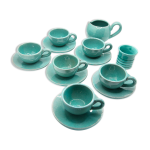 Lot de 6 tasses en terre émaillée bleu turquoise avec leurs soucoupes et leur pot à lait Lot de 6 tasses en terre émaillée bleu turquoise avec leurs soucoupes et leur pot à lait