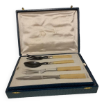 Mnagre de 26 couverts de table en inox et baklite