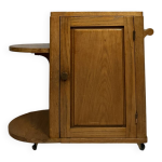 Meuble bar / desserte a roulette époque art déco en chene vers 1940 Meuble bar / desserte a roulette époque art déco en chene vers 1940