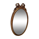 Miroir mdaillon en bois dor - 43x24cm