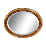 Miroir ovale en bois dor� d�but xxe