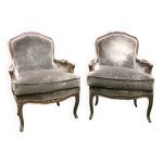 Paire de bergres de style louis xv en bois moulur et sculpt