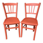 Paire de chaises bistrot type thonet ou baumann de couleur orange douce