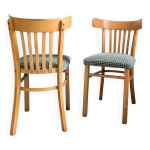 Paire de chaises bistrot vintage en bois, dossier arrondi, style mid - century
