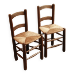 Paire de chaises en bois, assise en paille tresse