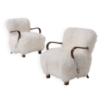 Paire de fauteuils art dco scandinaves en peau de mouton de mongolie, annes 1950