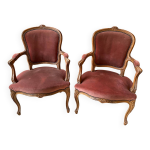 Paire de fauteuils bergeres style louis xv avec accoudoirs velours rose Paire de fauteuils bergeres style louis xv avec accoudoirs velours rose