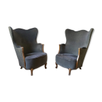 Paire de fauteuils bergre tonneau sculpturale