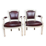 Paire de fauteuils cabriolets louis xvi en bois laqu et cuir, circa 1850