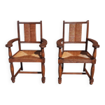 Paire de fauteuils en chne, assises et dossiers paills.