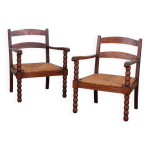 Paire de fauteuils en chêne et paille des années 1940 Paire de fauteuils en chêne et paille des années 1940