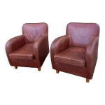 Paire de fauteuils club en cuir